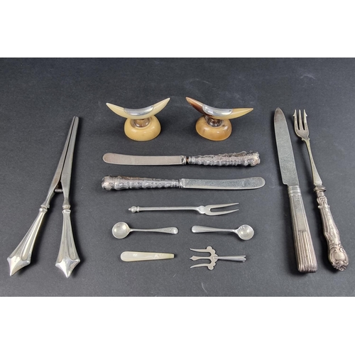 63 - A mixed group of silver and silver mounted items, to include two silver mounted carved bone knife re... 