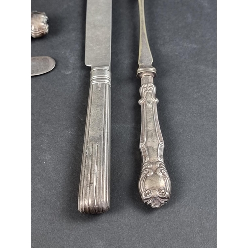 63 - A mixed group of silver and silver mounted items, to include two silver mounted carved bone knife re... 