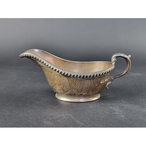 7 - A silver sauce boat, by Elkington & Co Ltd, Birmingham 1911, 6.5cm high, 282g.... 