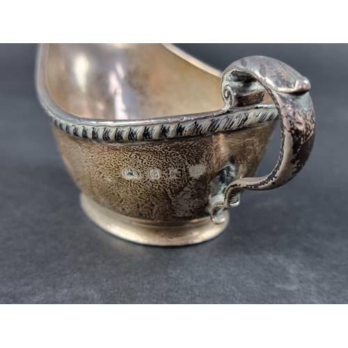 7 - A silver sauce boat, by Elkington & Co Ltd, Birmingham 1911, 6.5cm high, 282g.... 