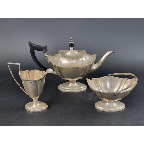 77 - A silver three piece tea set, by Mappin & Webb Ltd, Sheffield 1919, teapot height to handle... 