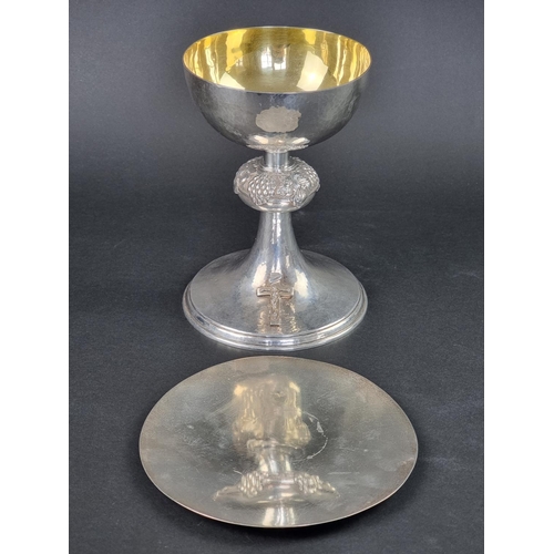 79 - A hammered silver and parcel gilt chalice and paten, by F Osborne & Co Ltd, London 1957, the cha... 