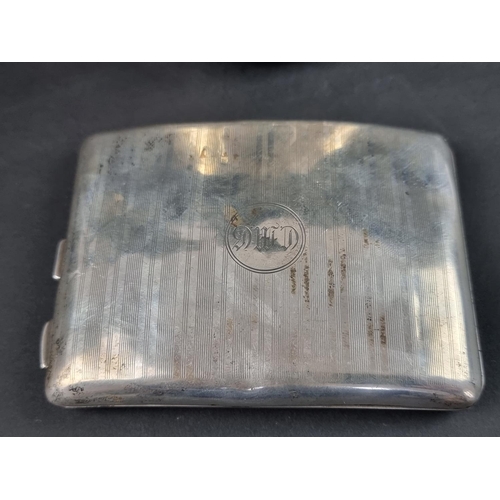 81 - A silver cigarette case, by William Neale & Son Ltd, Birmingham 1929, 12cm wide; together w... 