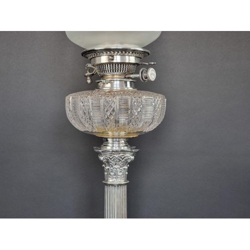 1A - An Edwardian silver Corinthian column oil lamp, by Mappin and Webb, Sheffield 1906, height to top of... 