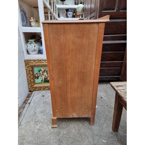 1011 - A small pale oak chest of drawers, 76cm wide.