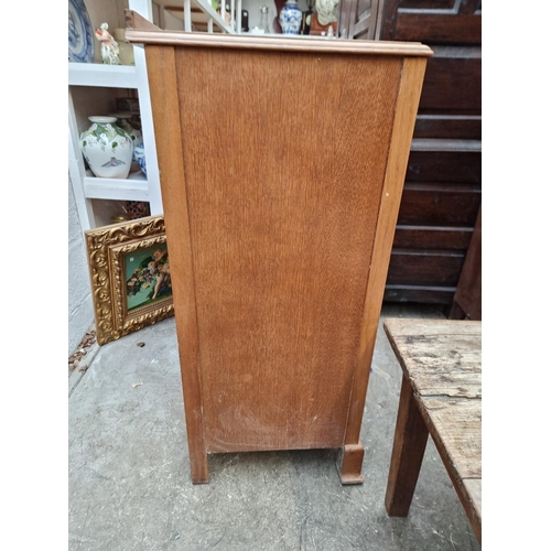 1011 - A small pale oak chest of drawers, 76cm wide.