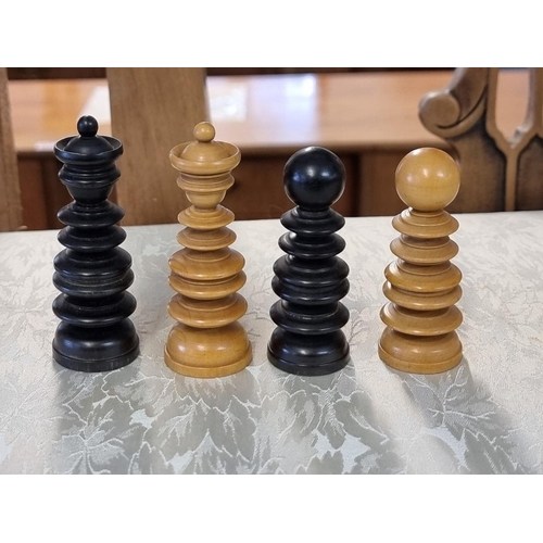 1405 - A boxwood and ebony chess set, king 8.1cm high, pawn 4cm high; together with another Staunton patter... 