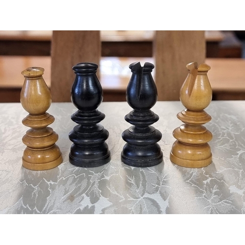 1405 - A boxwood and ebony chess set, king 8.1cm high, pawn 4cm high; together with another Staunton patter... 