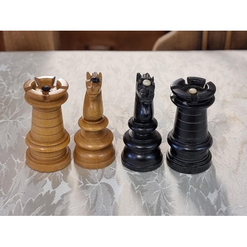 1405 - A boxwood and ebony chess set, king 8.1cm high, pawn 4cm high; together with another Staunton patter... 