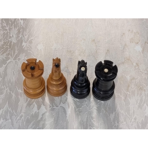 1405 - A boxwood and ebony chess set, king 8.1cm high, pawn 4cm high; together with another Staunton patter... 