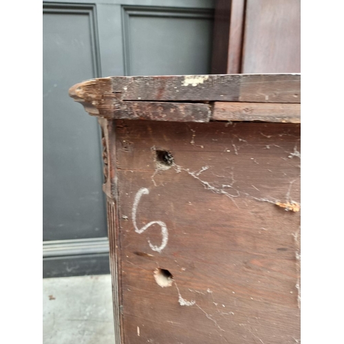 1017 - An unusual antique continental walnut corner cupboard, 88cm wide.