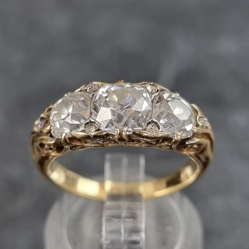 193 - A late Victorian yellow metal diamond half hoop ring, set three old cut diamonds and six small rose ...