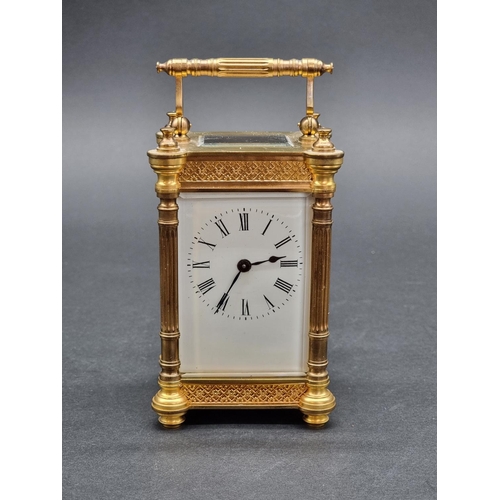 1104 - An antique French gilt brass carriage timepiece, height including handle 15.5cm.... 