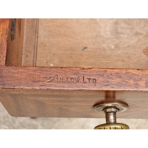 1002 - A small 1930s mahogany desk, stamped 'Waring & Gillow Ltd', 71cm wide, (faults to top).... 