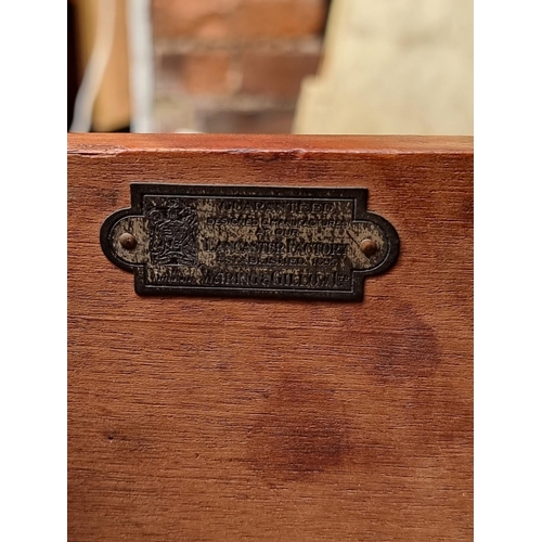 1002 - A small 1930s mahogany desk, stamped 'Waring & Gillow Ltd', 71cm wide, (faults to top).... 