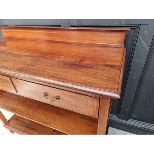 1011 - An Edwardian mahogany, line inlaid and satinwood crossbanded buffet, 122cm wide.... 