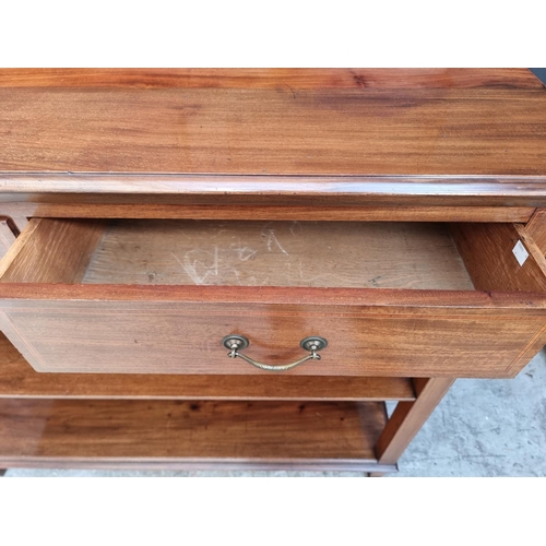 1011 - An Edwardian mahogany, line inlaid and satinwood crossbanded buffet, 122cm wide.... 