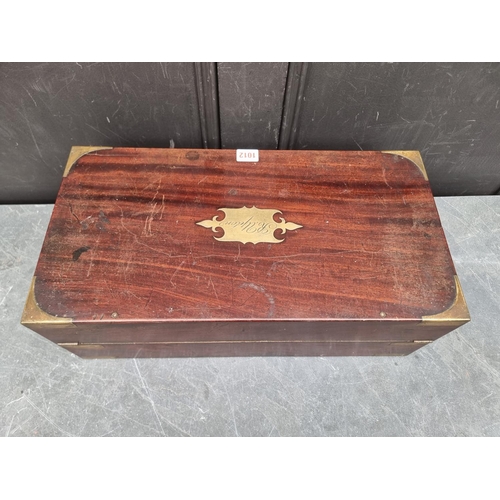 1012 - A 19th century mahogany and brass bound writing slope, bearing brass plaque inscribed 'R Upton', 50.... 