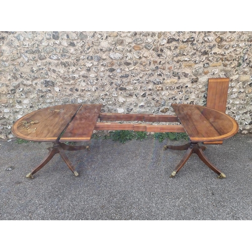 1014 - A 19th century mahogany, satinwood crossbanded and line inlaid twin pedestal dining table, stam... 