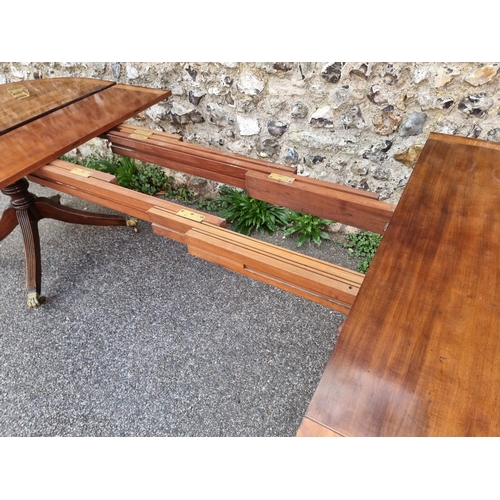 1014 - A 19th century mahogany, satinwood crossbanded and line inlaid twin pedestal dining table, stam... 