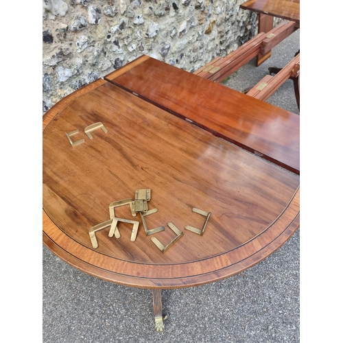 1014 - A 19th century mahogany, satinwood crossbanded and line inlaid twin pedestal dining table, stam... 