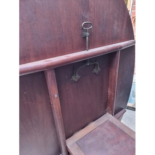 1019 - A 19th century mahogany oval tilt-top breakfast table, on reeded outswept legs, 152.5cm wide.... 