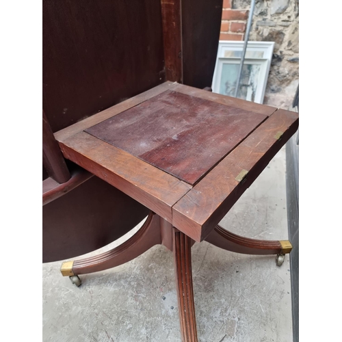 1019 - A 19th century mahogany oval tilt-top breakfast table, on reeded outswept legs, 152.5cm wide.... 