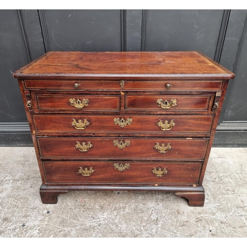 1020 - An unusual George III mahogany, burr yew, line inlaid and brass strung chest of drawers, incorp... 