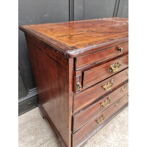 1020 - An unusual George III mahogany, burr yew, line inlaid and brass strung chest of drawers, incorp... 