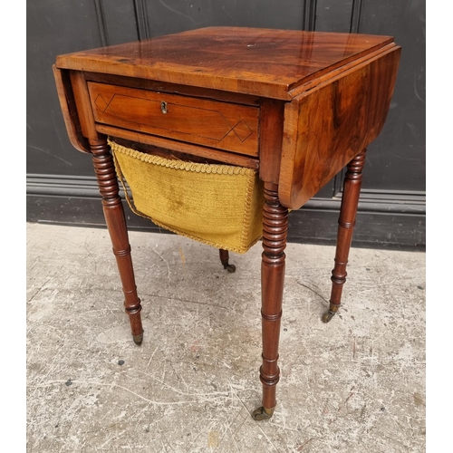 1021 - A George IV mahogany and crossbanded Pembroke work table, 79cm wide when open.