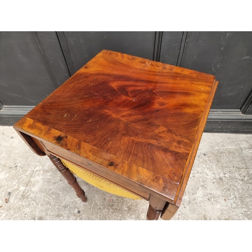 1021 - A George IV mahogany and crossbanded Pembroke work table, 79cm wide when open.