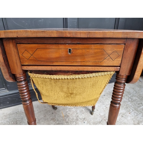 1021 - A George IV mahogany and crossbanded Pembroke work table, 79cm wide when open.