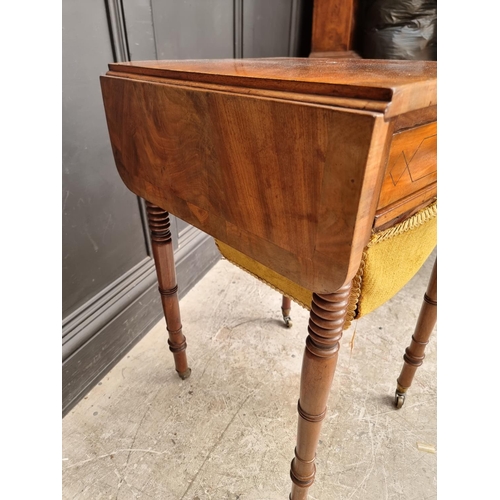 1021 - A George IV mahogany and crossbanded Pembroke work table, 79cm wide when open.