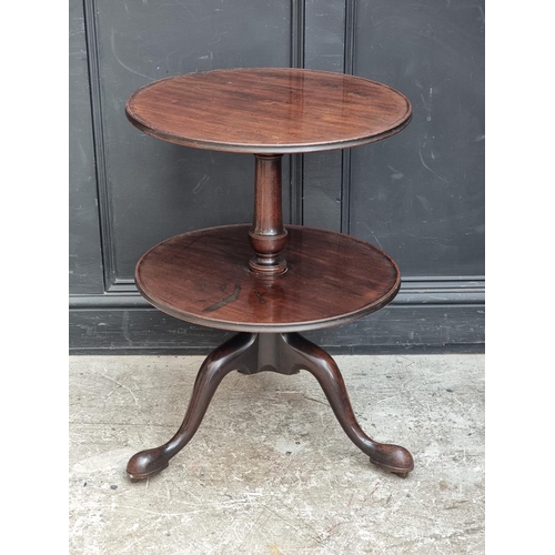 1022 - A George III mahogany two-tier dumb waiter, on concealed brass casters, 57cm diameter, (alterat... 