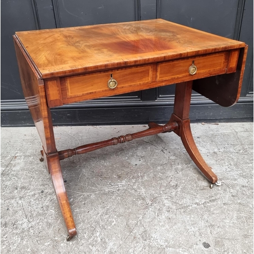 1024 - A 19th century mahogany and crossbanded sofa table, 80.5cm wide when closed.