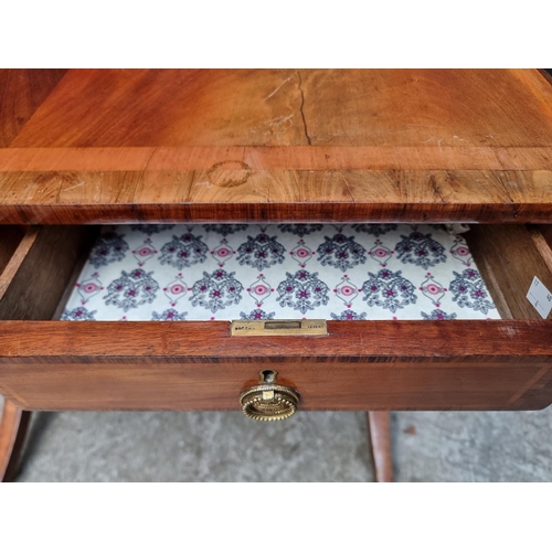 1024 - A 19th century mahogany and crossbanded sofa table, 80.5cm wide when closed.