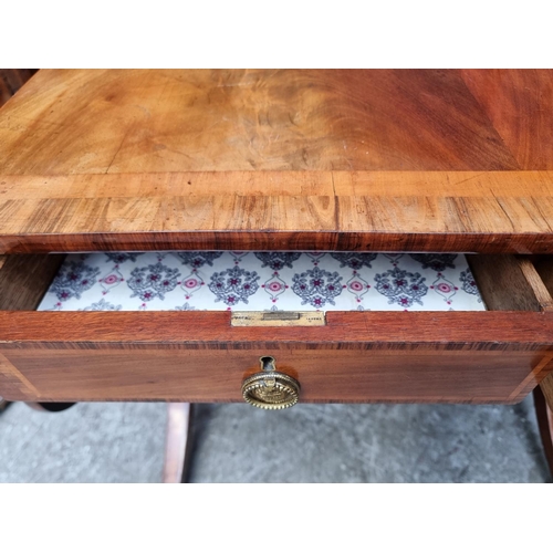 1024 - A 19th century mahogany and crossbanded sofa table, 80.5cm wide when closed.