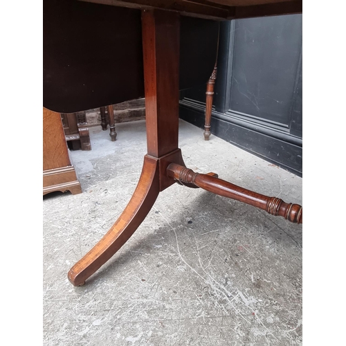 1024 - A 19th century mahogany and crossbanded sofa table, 80.5cm wide when closed.