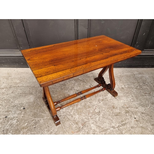 1025 - A small rosewood rectangular low occasional table, 66.5cm wide.