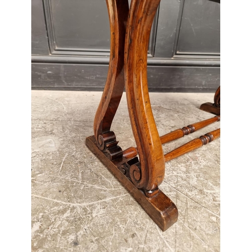 1025 - A small rosewood rectangular low occasional table, 66.5cm wide.