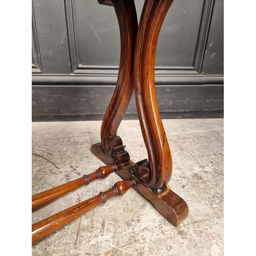 1025 - A small rosewood rectangular low occasional table, 66.5cm wide.