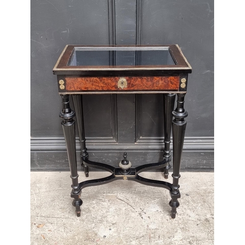 1026 - A small late 19th century, Louis XIV style, ebonised and amboyna bijouterie table, the top 50.5... 