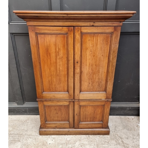 1035 - An unusual mahogany cabinet, the upper section fitted with twenty four small filing drawers, 142.5cm... 