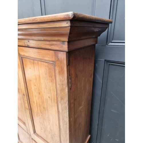 1035 - An unusual mahogany cabinet, the upper section fitted with twenty four small filing drawers, 142.5cm... 