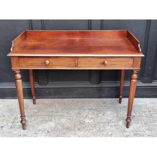 1041 - A Victorian mahogany washstand, 107cm wide.