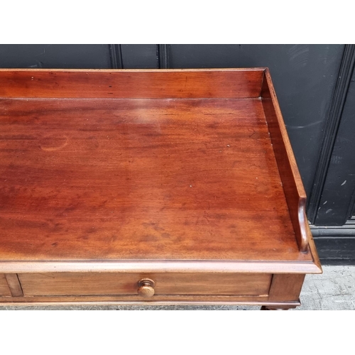 1041 - A Victorian mahogany washstand, 107cm wide.