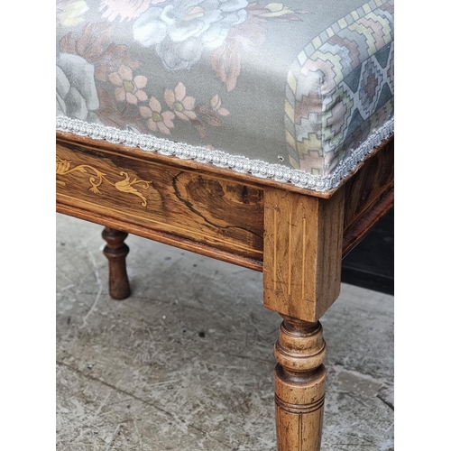 1042 - A late Victorian rosewood and inlaid piano stool, with hinged seat, 49cm wide.