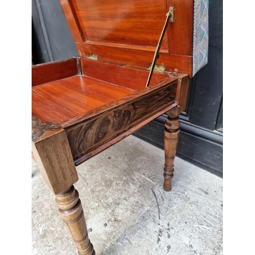 1042 - A late Victorian rosewood and inlaid piano stool, with hinged seat, 49cm wide.