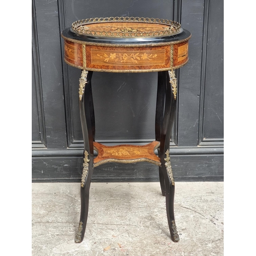 1043 - A Louis XV style burr walnut, ebonised and inlaid jardiniere, 46cm wide.