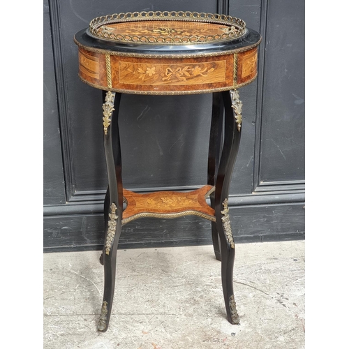 1043 - A Louis XV style burr walnut, ebonised and inlaid jardiniere, 46cm wide.